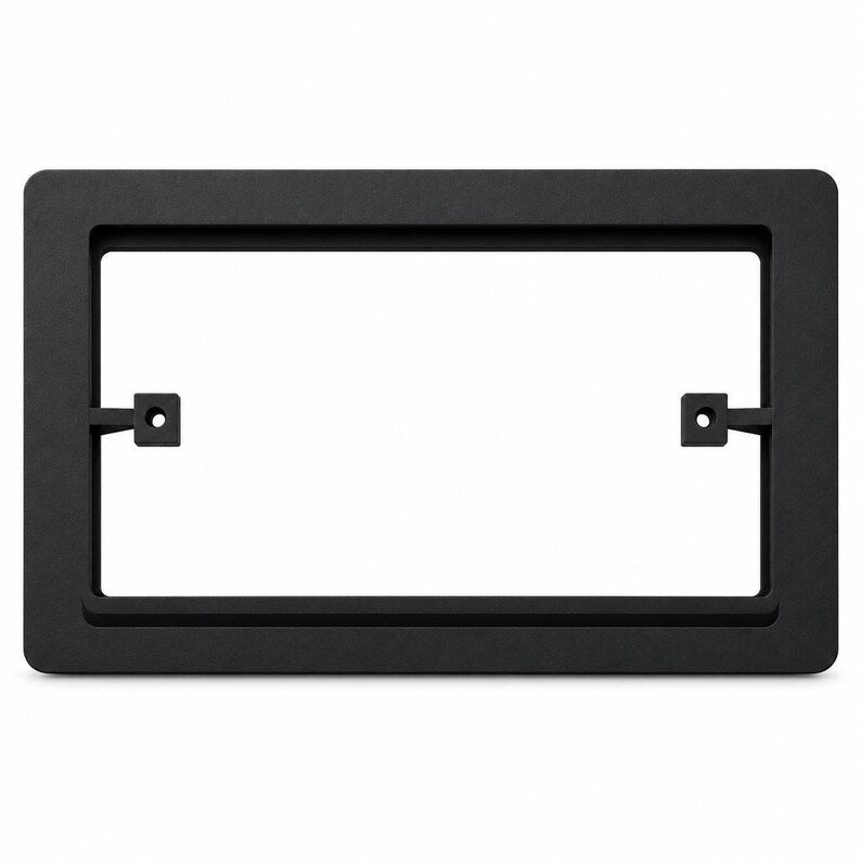 Recessed socket surround fitted behind faceplate