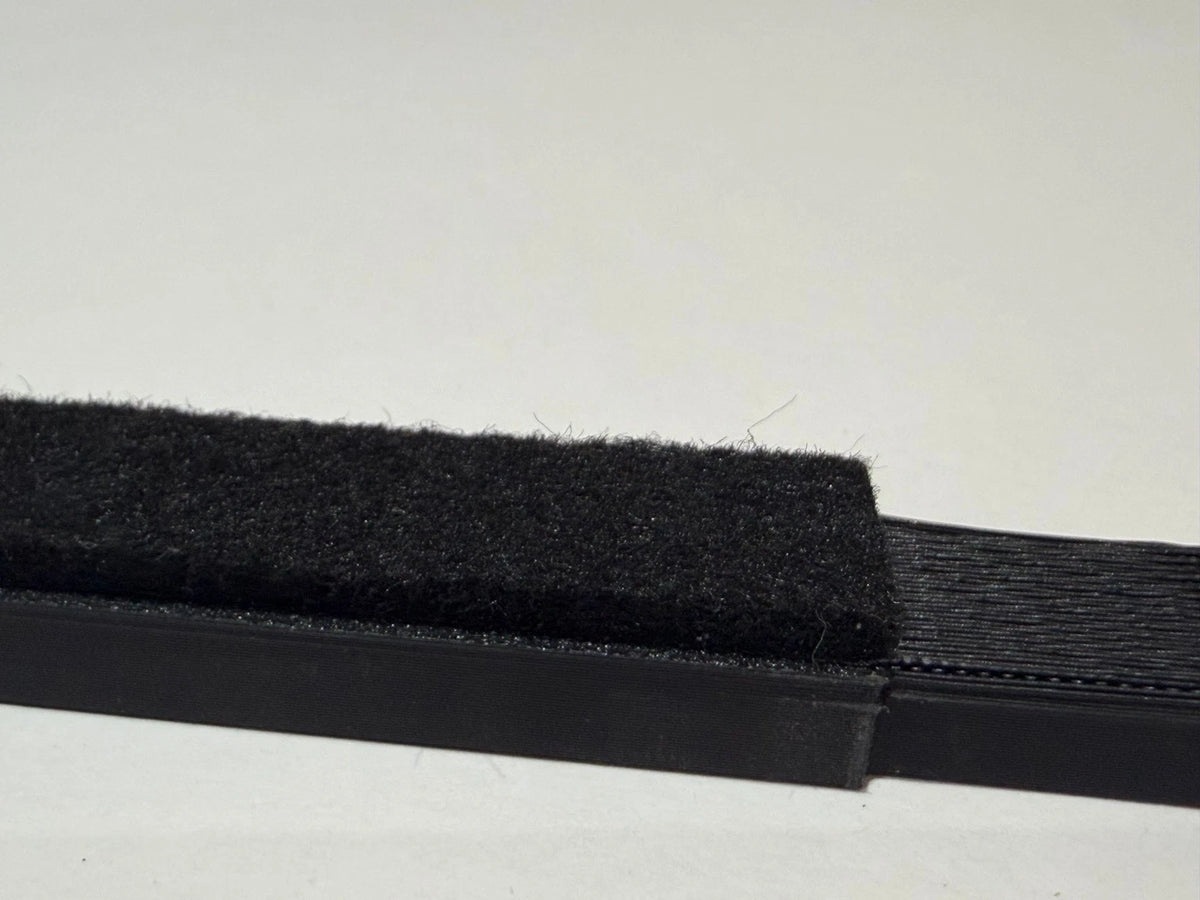 Two felt-finish cable duct covers joined end to end