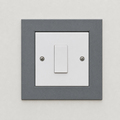 Self-adhesive backing on the switch surround